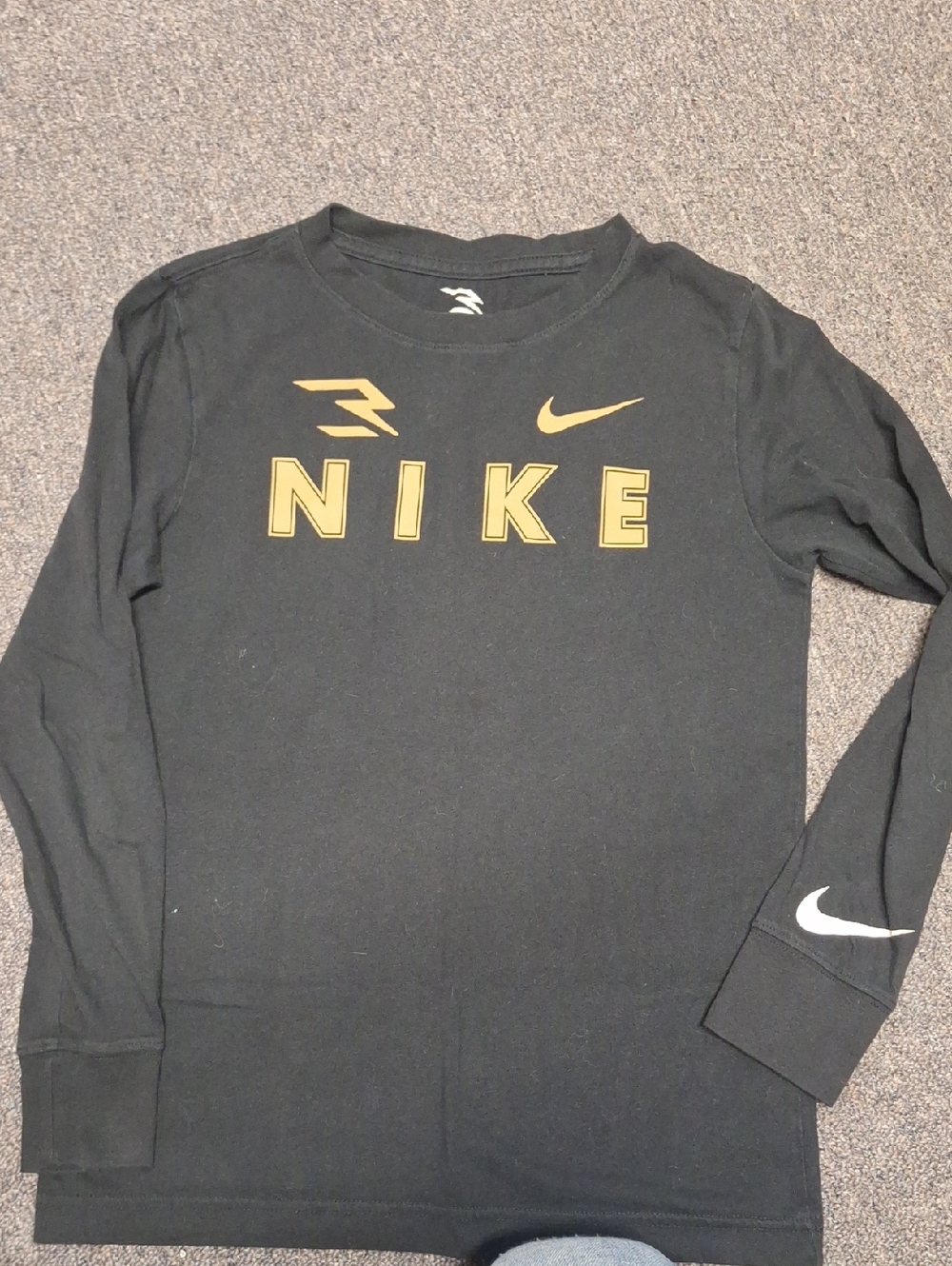 Nike Black Long-Sleeve Tee with Gold Lettering